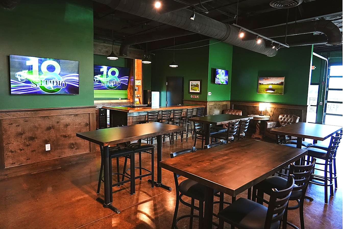 Studio 18 club lounge with bar and seating